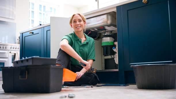Garbage Disposal Repair Pros technician performing garbage disposal service