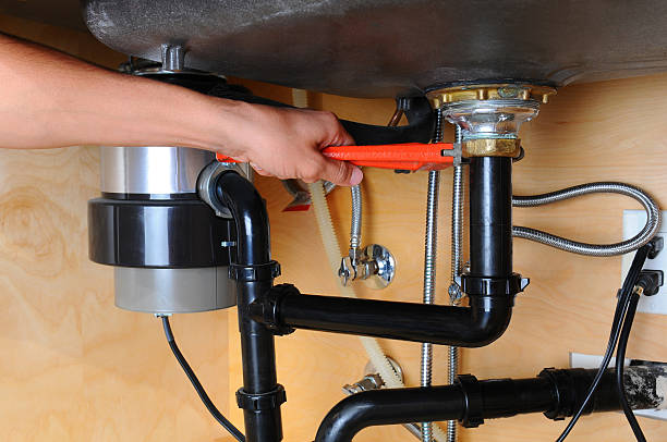 Jammed Disposal Clearing performed by a Garbage Disposal Repair Pros technician